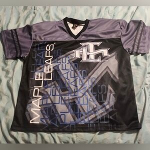 Vintage‎ Toronto Maple Leafs . Features bold logo and text. Perfect for fans.